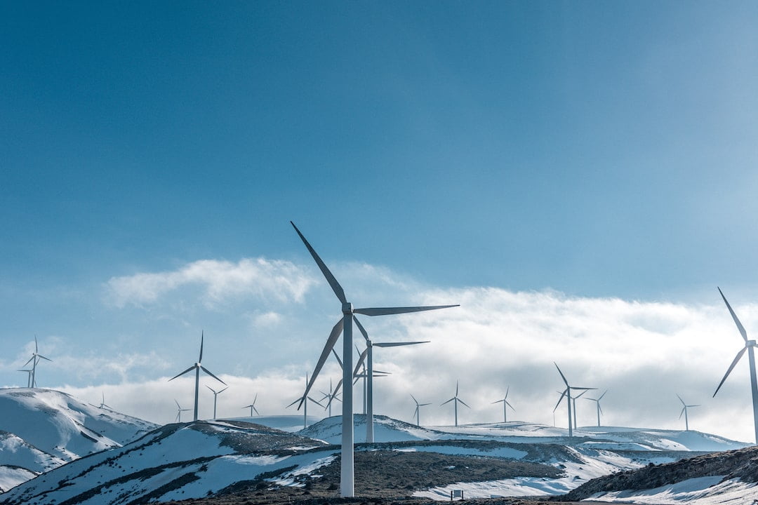 All wind turbines side by side producing pure electricity without destroying our beloved planet Earth.